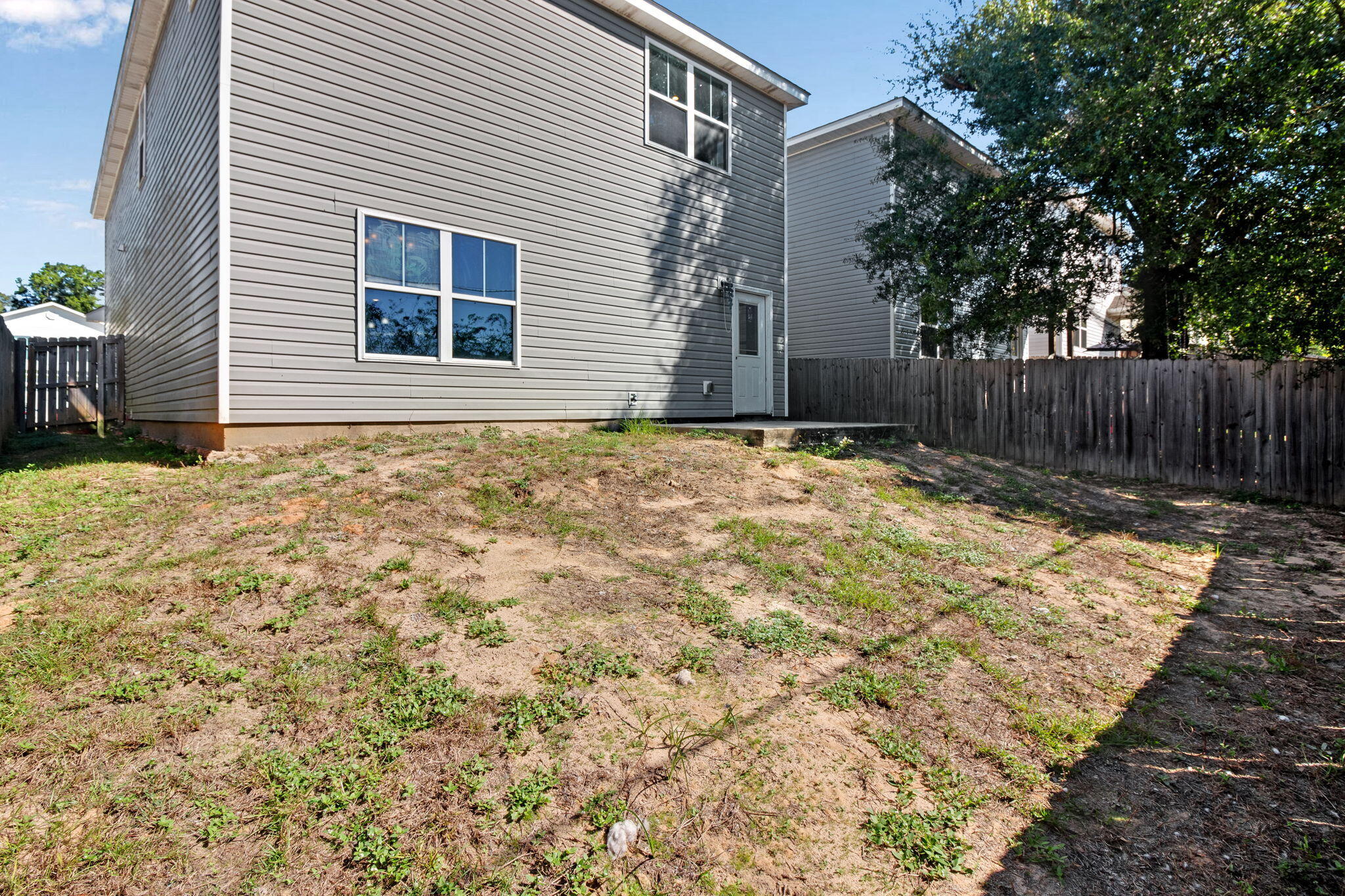189 Johnson Court Crestview, FL 32536 - Photo 19 of 20 a view of a backyard of the house