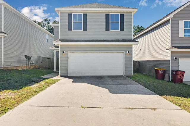 a front view of house with yard