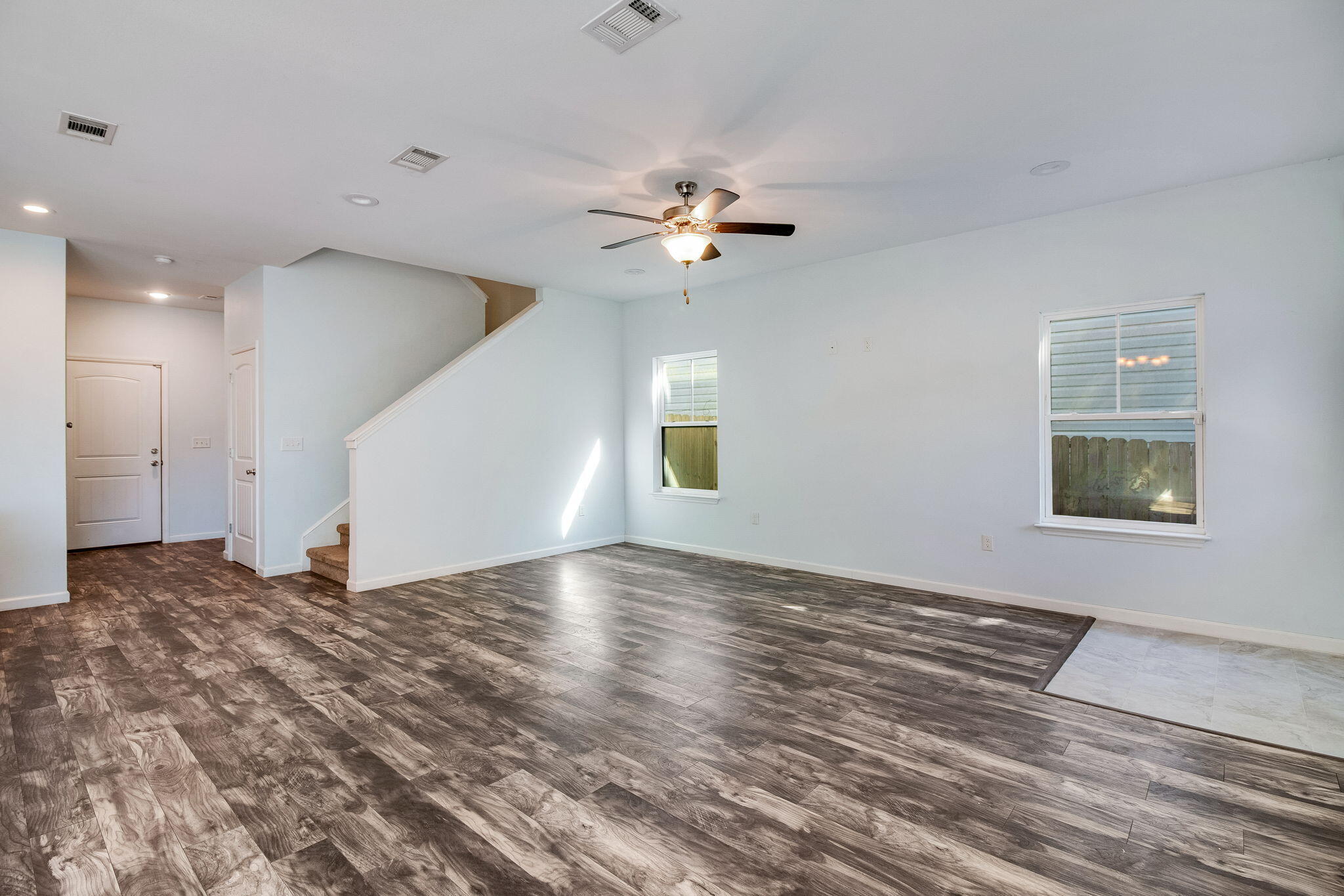 189 Johnson Court Crestview, FL 32536 - Photo 7 of 20 a view of empty room with wooden floor and fan