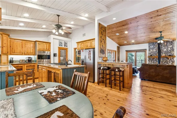 a view of a dining room with furniture window and outside view