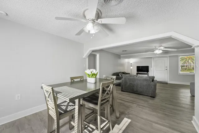 a view of a dining room with furniture