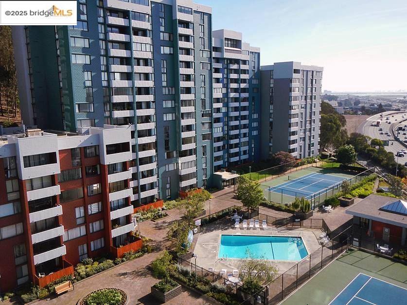 555 Pierce Street, Unit 104 Albany, CA 94706 - Photo 1 of 1 a view of a city with tall buildings