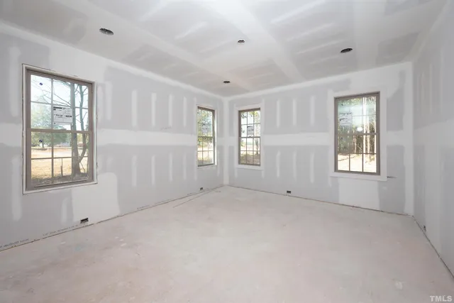 a view of a hallway with windows