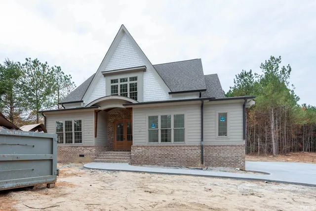 a view of a yard in front of a house