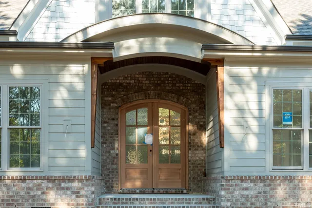 a view of a balcony with wooden floor