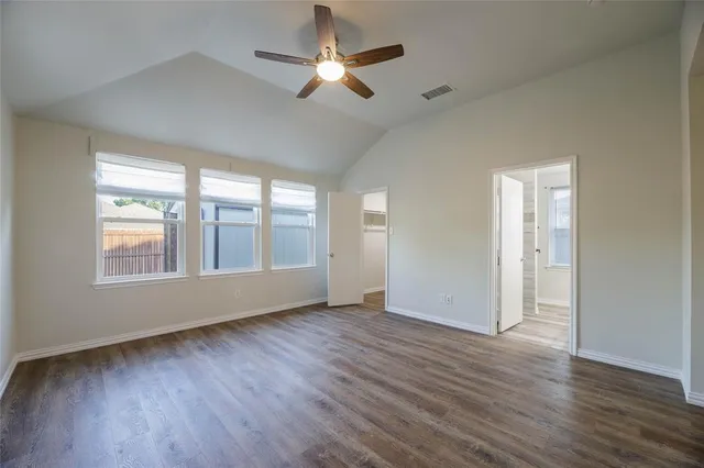 a view of room window and wooden floor