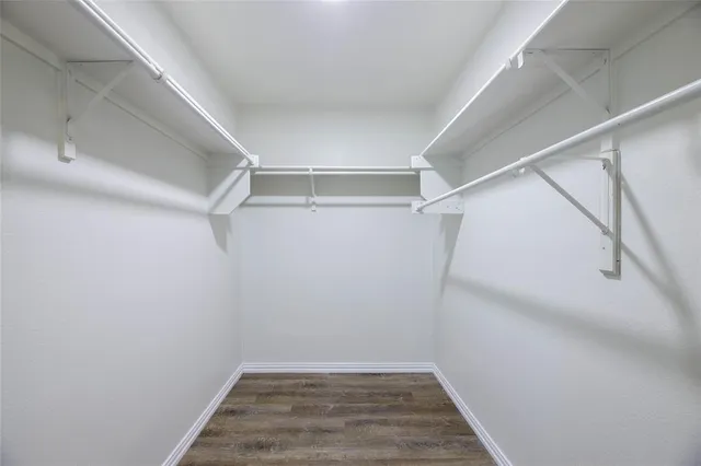 a view of a room with racks on the wall