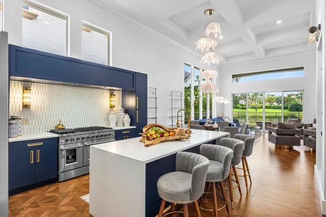 a kitchen with a table and chairs in it