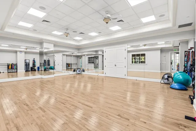 a view of a living room and kitchen