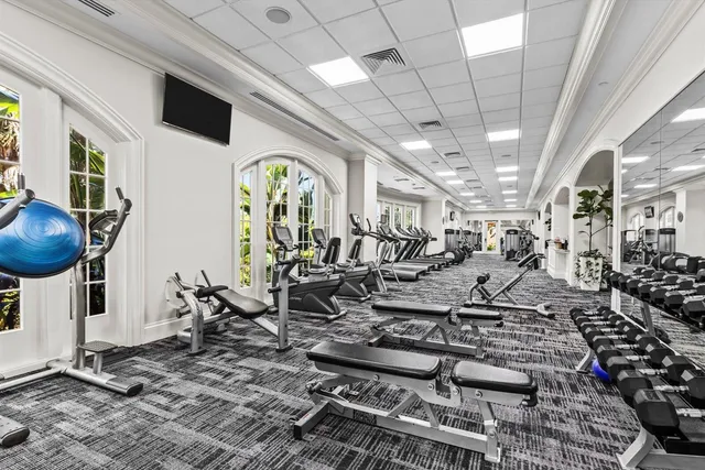 an aerial view of a residential houses with outdoor space