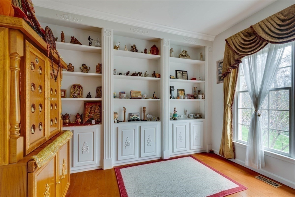 22 Robert Road Marlborough, MA 01752 - Photo 17 of 42 a view of walk in closet with clothes and shoes