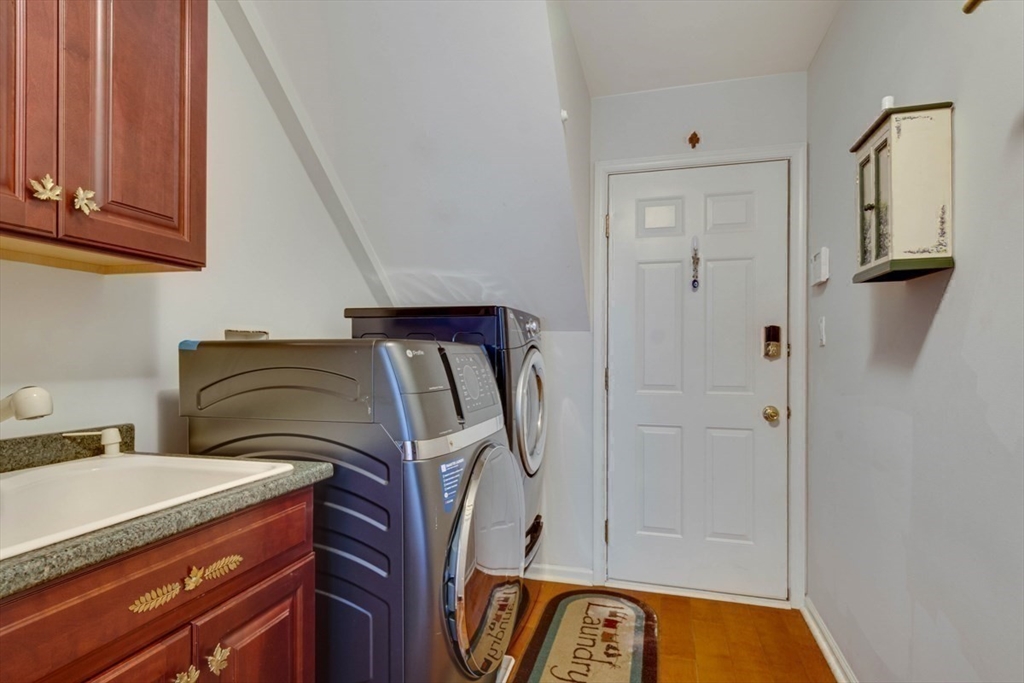 22 Robert Road Marlborough, MA 01752 - Photo 22 of 42 a utility room with dryer and washer