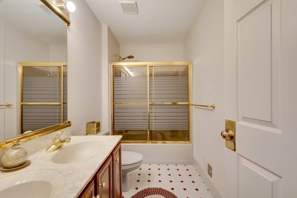 22 Robert Road Marlborough, MA 01752 - Photo 30 of 42 a bathroom with a sink toilet and shower