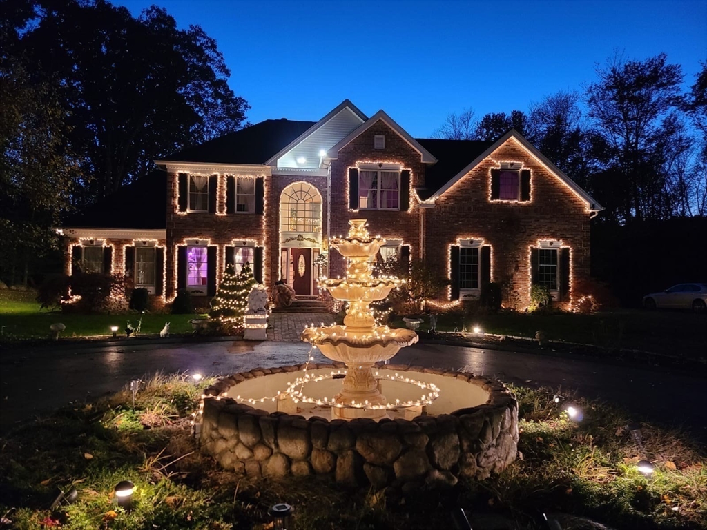 22 Robert Road Marlborough, MA 01752 - Photo 41 of 42 a front view of a house with yard and parking