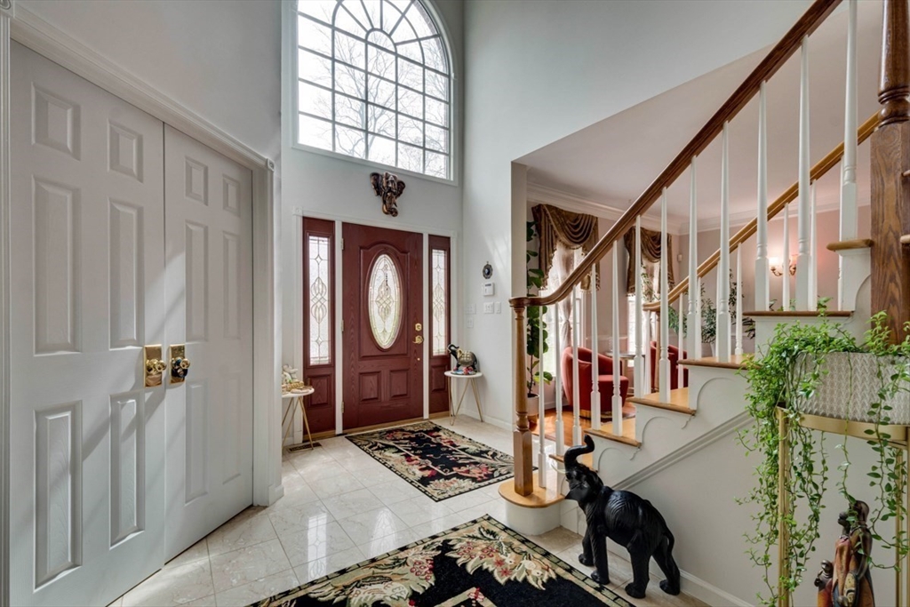 22 Robert Road Marlborough, MA 01752 - Photo 5 of 42 a view of an entryway with wooden floor