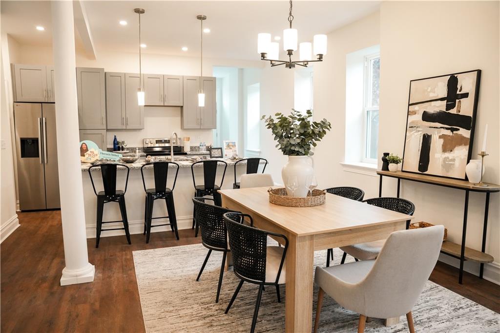 121 Shetland Street Pittsburgh, PA 15206 - Photo 11 of 37 a view of a dining room with furniture and wooden floor