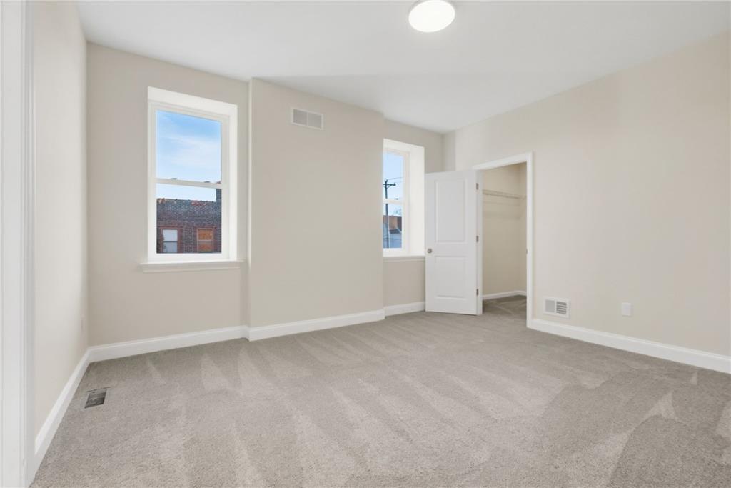 121 Shetland Street Pittsburgh, PA 15206 - Photo 31 of 37 an empty room with windows and closet
