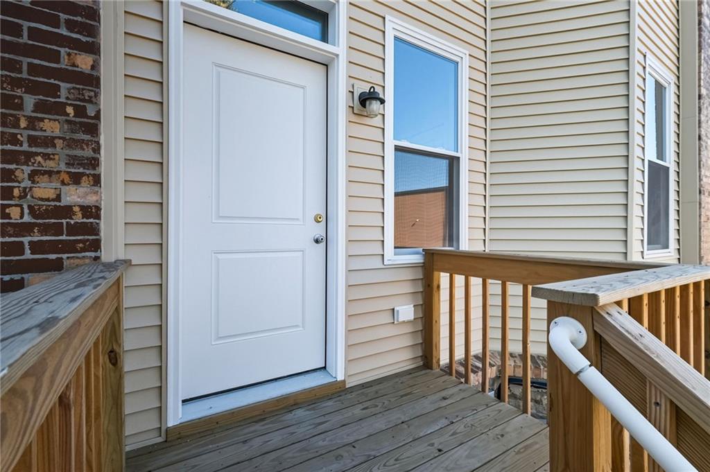 121 Shetland Street Pittsburgh, PA 15206 - Photo 35 of 37 a view of a balcony with wooden floor and staircase