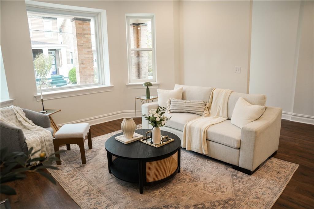 121 Shetland Street Pittsburgh, PA 15206 - Photo 9 of 37 a living room with furniture and a window