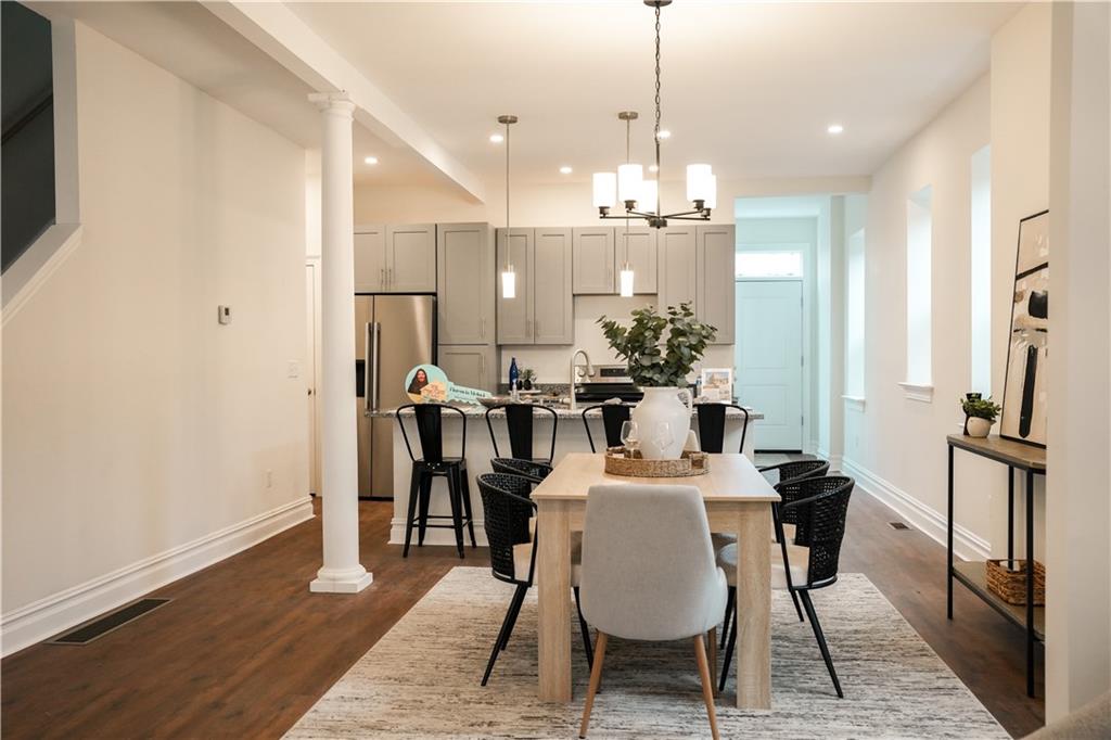 121 Shetland Street Pittsburgh, PA 15206 - Photo 10 of 37 a view of a dining room with furniture window and wooden floor