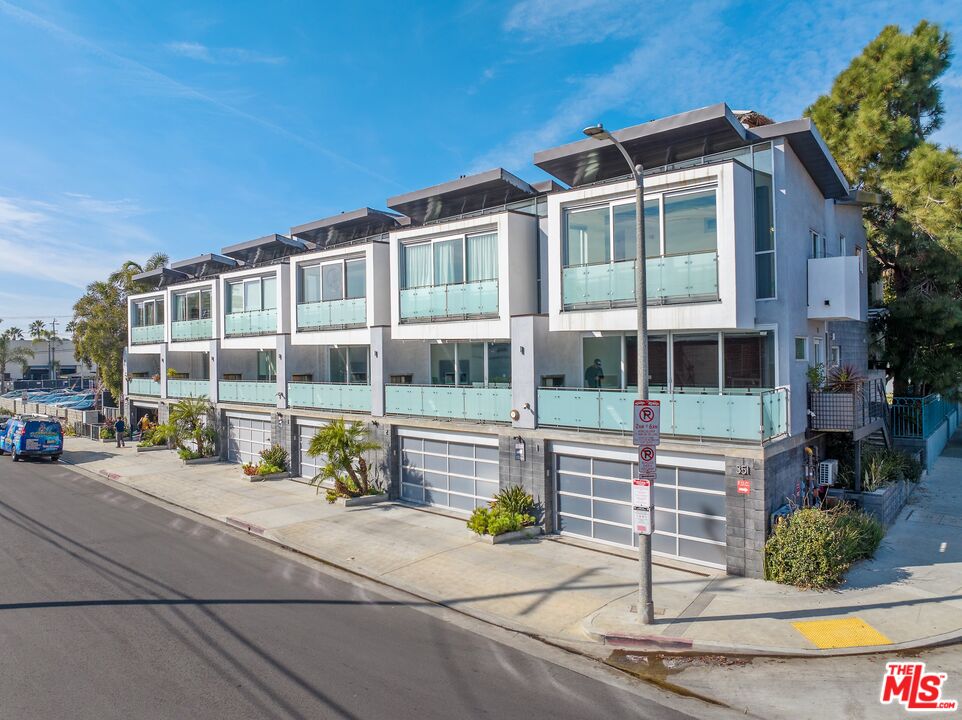 351 Sunset Avenue, Unit 1 Venice, CA 90291 - Photo 1 of 25 a front view of a house with a yard