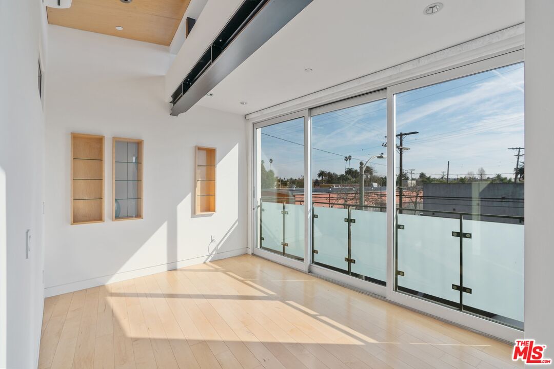 351 Sunset Avenue, Unit 1 Venice, CA 90291 - Photo 11 of 25 a view of a porch with a floor to ceiling windows