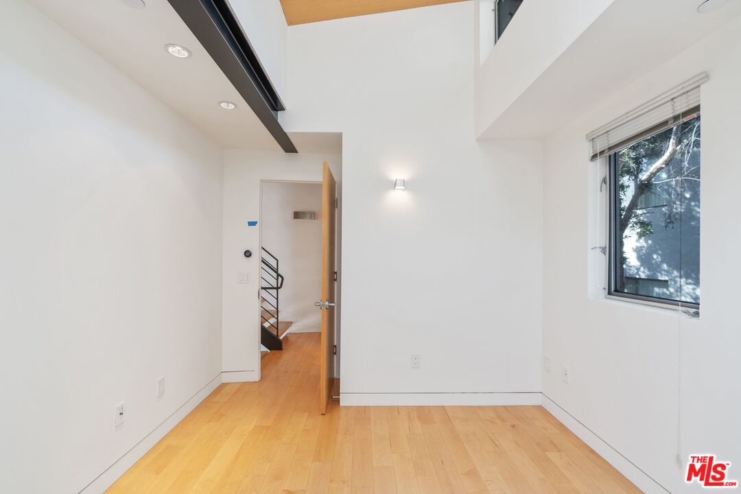 351 Sunset Avenue, Unit 1 Venice, CA 90291 - Photo 15 of 25 a view of a room with wooden floor and staircase