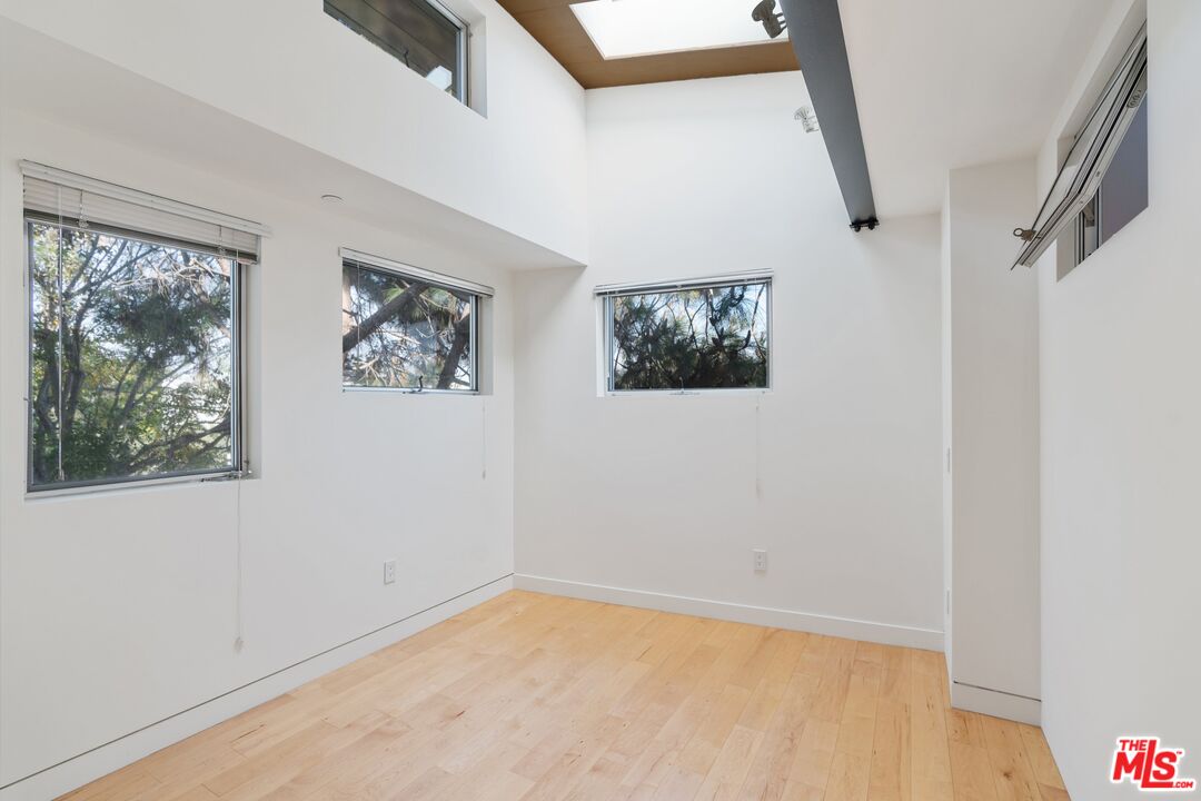 351 Sunset Avenue, Unit 1 Venice, CA 90291 - Photo 16 of 25 a view of empty room with windows