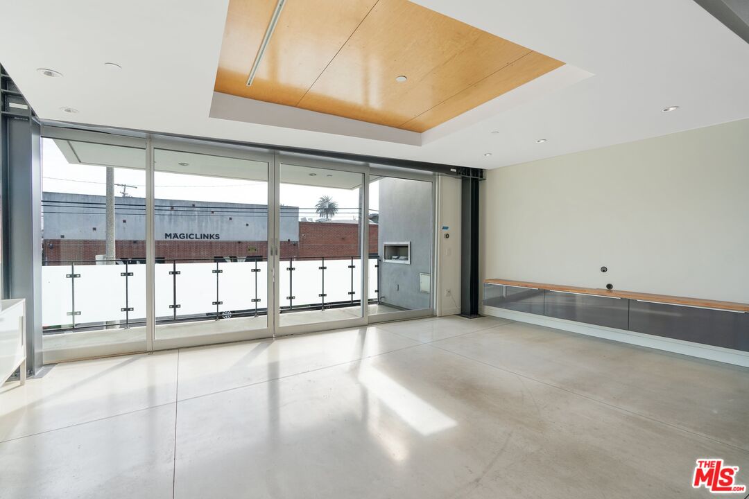 351 Sunset Avenue, Unit 1 Venice, CA 90291 - Photo 2 of 25 a view of an empty room with a balcony