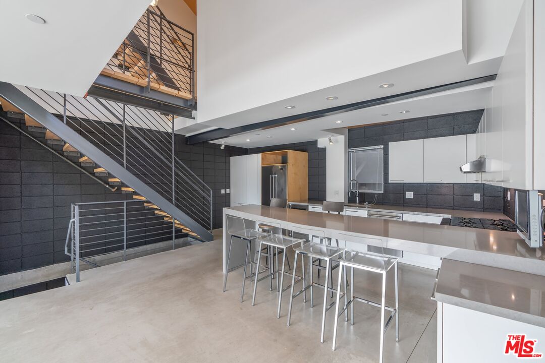 351 Sunset Avenue, Unit 1 Venice, CA 90291 - Photo 9 of 25 a kitchen with table chairs and entryway