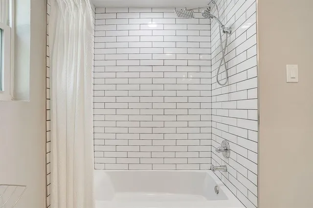 a bathroom with a bathtub