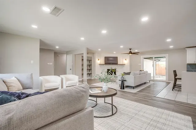 a living room with furniture and a couch