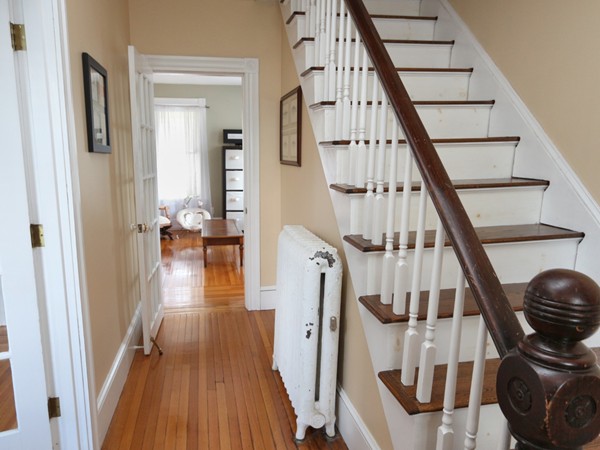 66 Winter Street Franklin, MA 02038 - Photo 13 of 30 a view of entryway with wooden floor and stairs