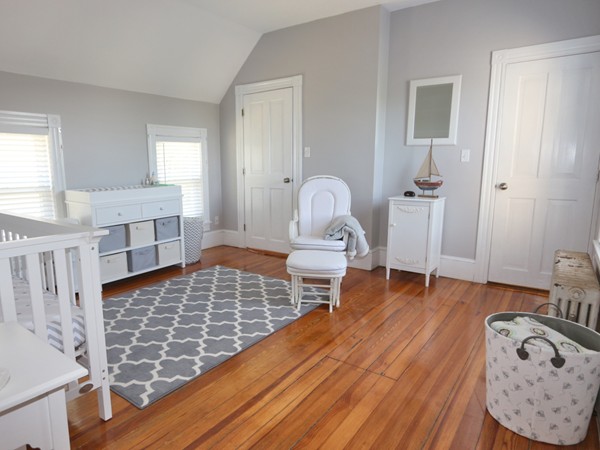 66 Winter Street Franklin, MA 02038 - Photo 16 of 30 a living room with furniture and wooden floor