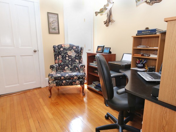 66 Winter Street Franklin, MA 02038 - Photo 17 of 30 a view of a workspace with furniture and wooden floor