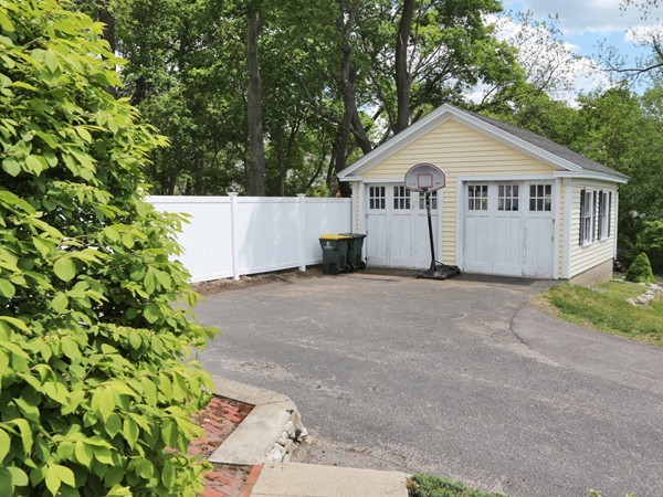 66 Winter Street Franklin, MA 02038 - Photo 25 of 30 a house with trees in the background