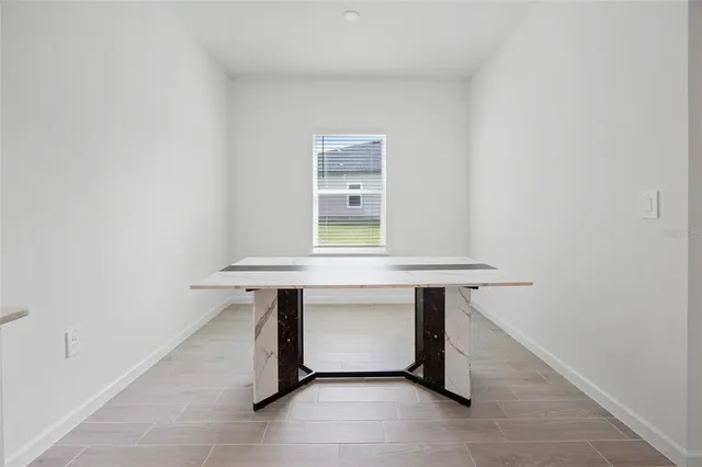 a room with table and window