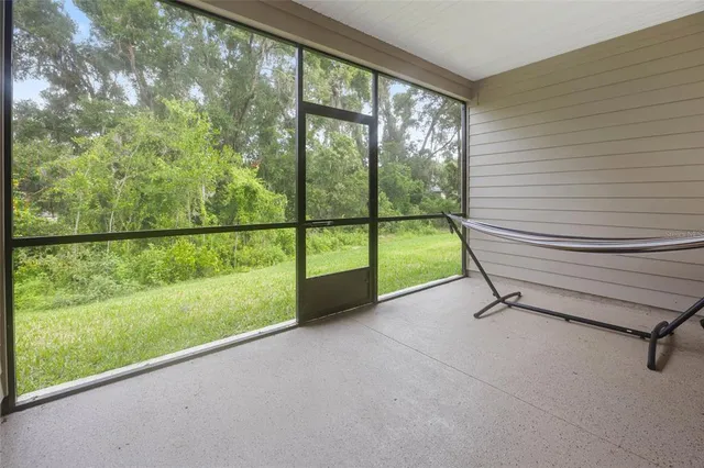 a view of a garden with an outdoor seating