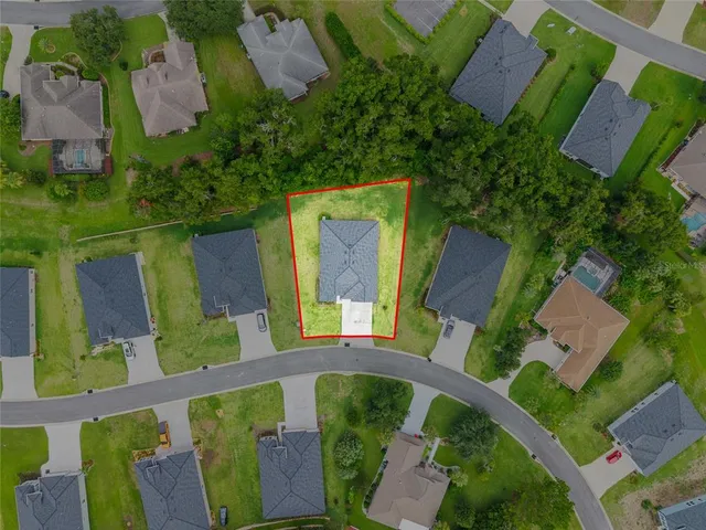 an aerial view of a house having outdoor seating