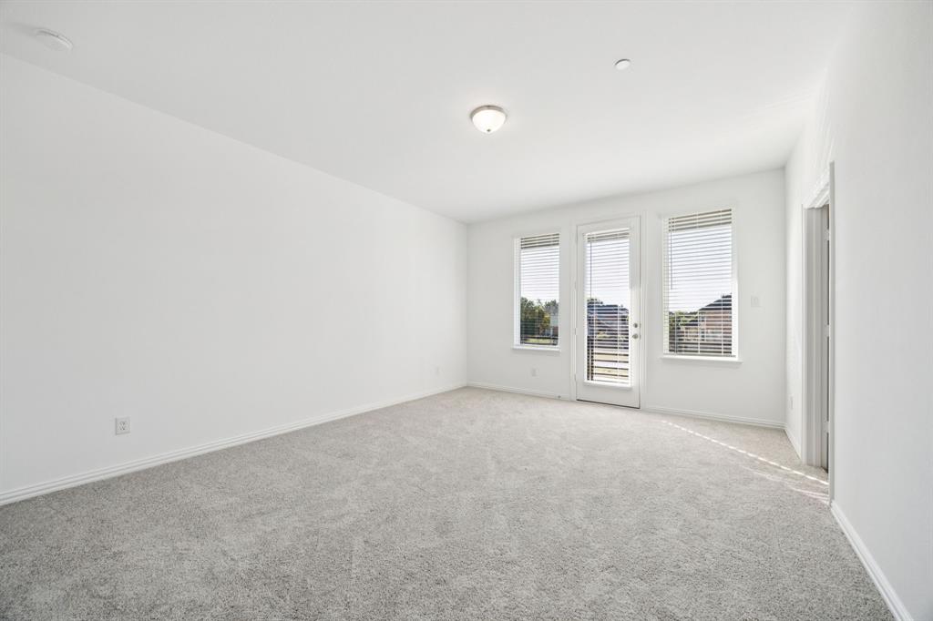 1164 Daybreak Drive Allen, TX 75013 - Photo 16 of 28 an empty room with windows
