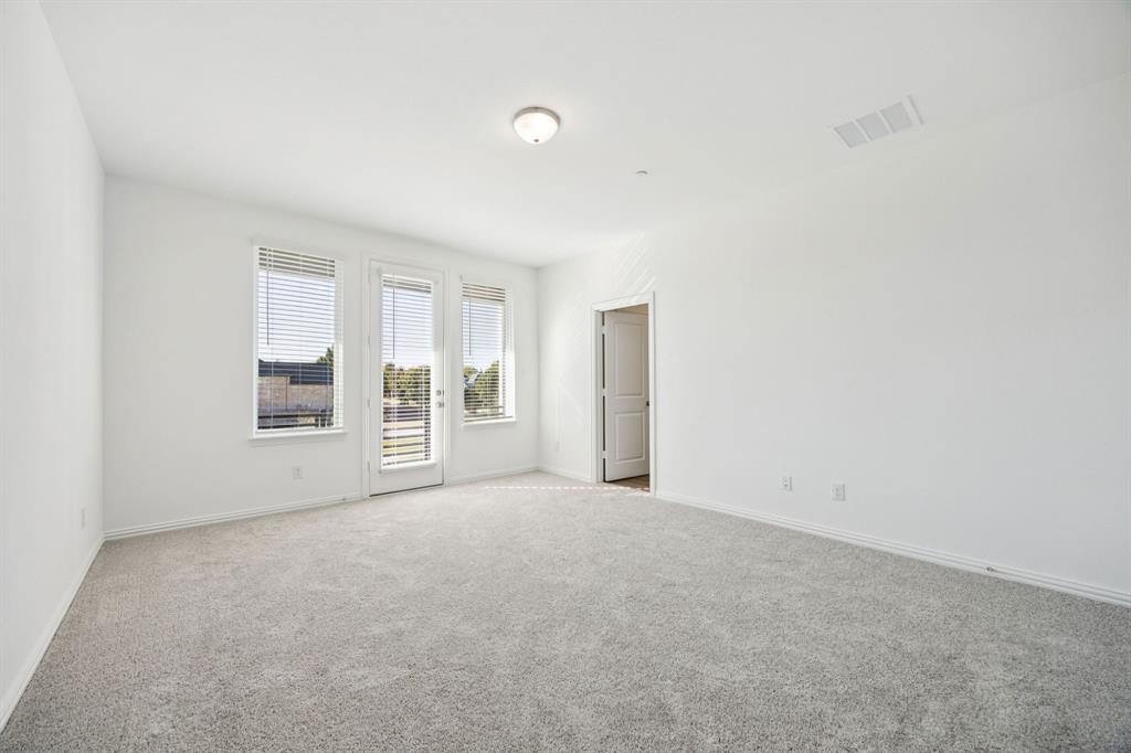 1164 Daybreak Drive Allen, TX 75013 - Photo 17 of 28 a view of an empty room with a window