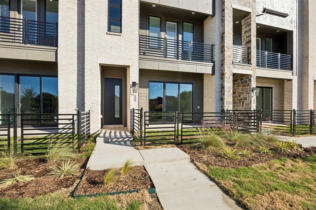 1164 Daybreak Drive Allen, TX 75013 - Photo 3 of 28 a view of a brick house with large windows
