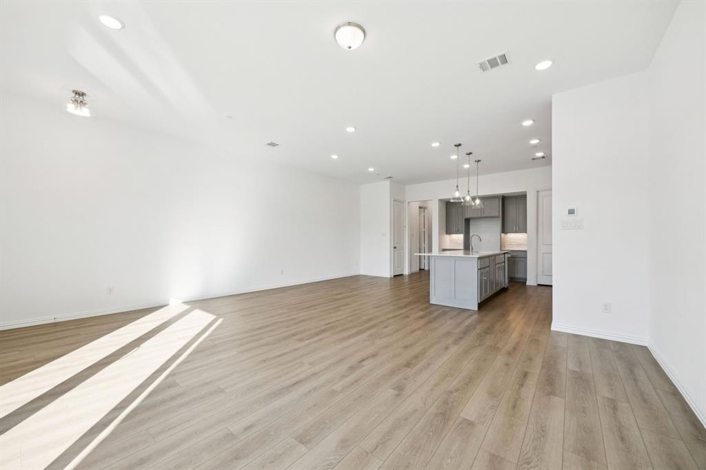1164 Daybreak Drive Allen, TX 75013 - Photo 8 of 28 a view of kitchen and wooden floor