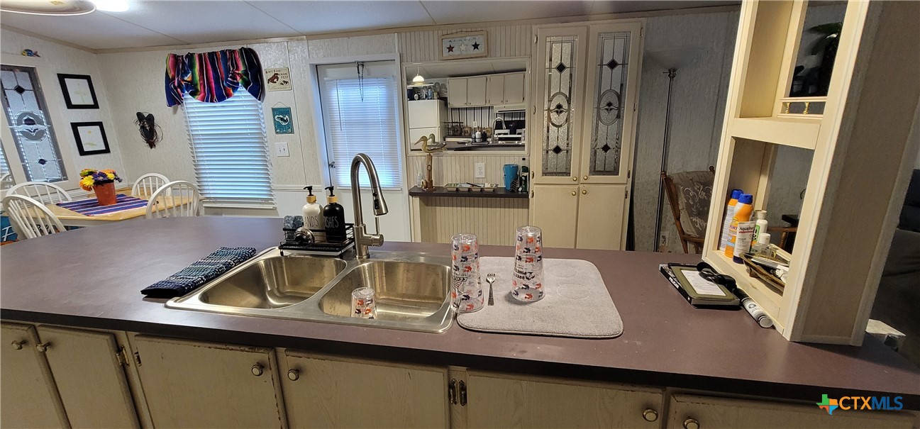 406 Denver Avenue Seadrift, TX 77983 - Photo 11 of 24 a view of living room with furniture and flat screen tv