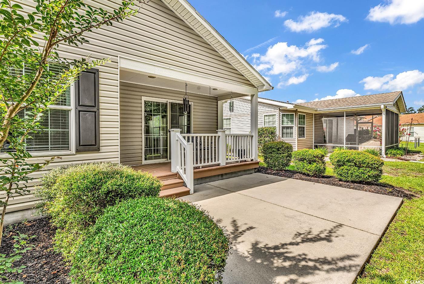301 Walden Lake Road Conway, SC 29526 - Photo 21 of 37 View of exterior entry featuring a porch