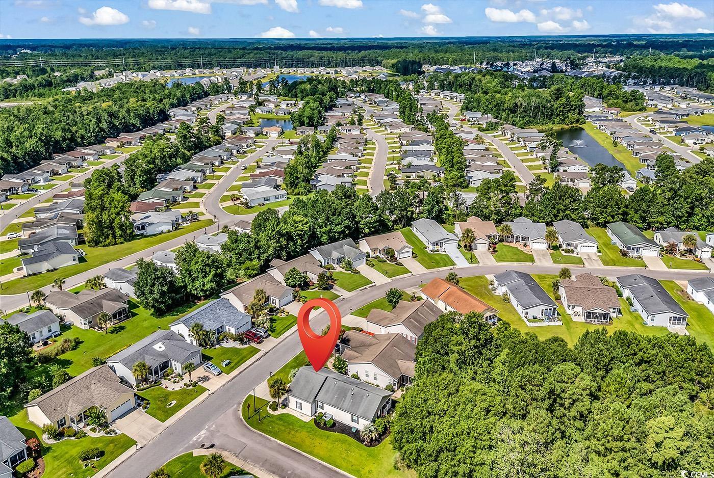 301 Walden Lake Road Conway, SC 29526 - Photo 24 of 37 Aerial perspective of suburban area with a large body of water