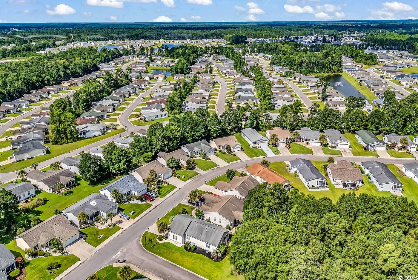 301 Walden Lake Road Conway, SC 29526 - Photo 27 of 37 Aerial perspective of suburban area featuring a large body of water