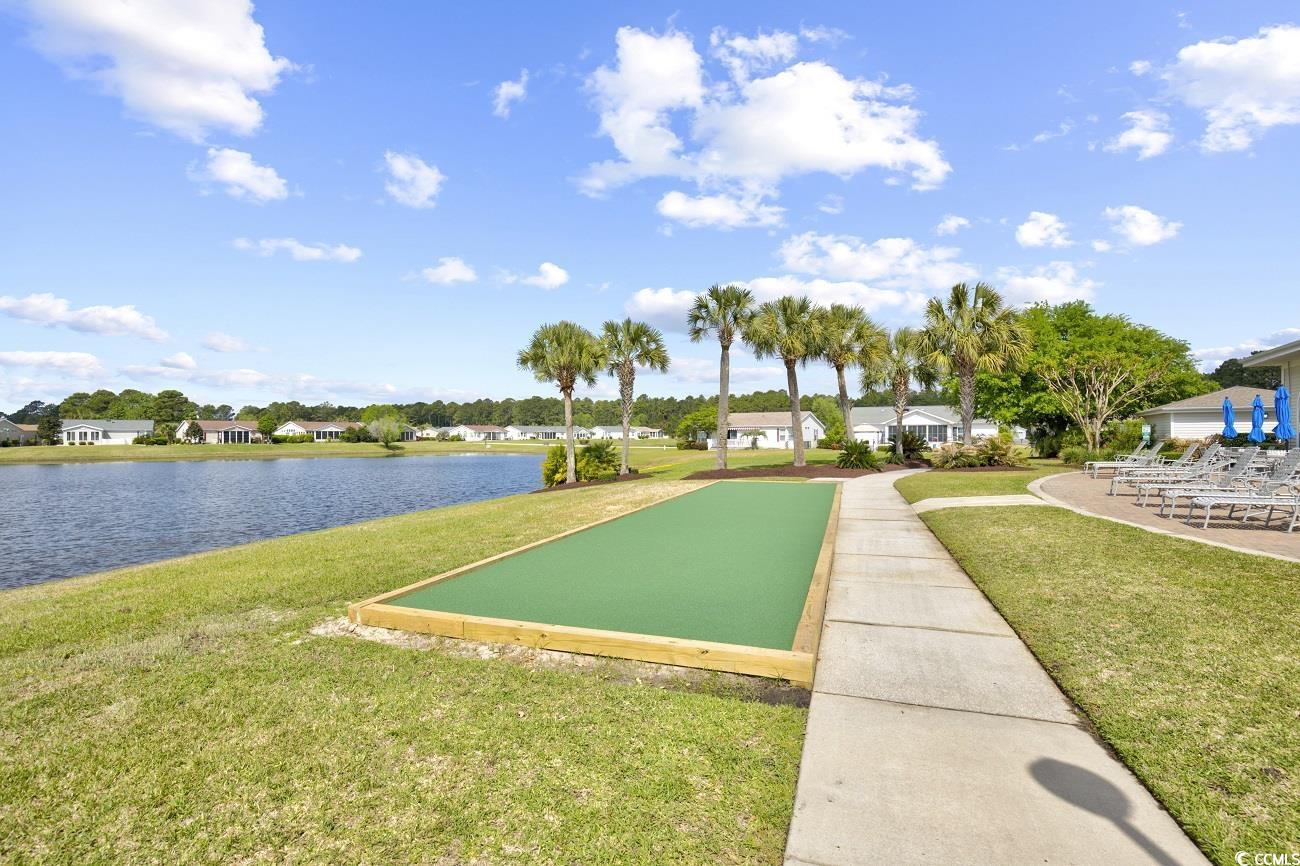 301 Walden Lake Road Conway, SC 29526 - Photo 34 of 37 View of community featuring a bocce ball area, a yard, a residential view, and a water view