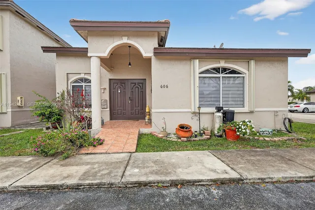 $445,000 | 18752 Northwest 84th Pl., Unit 6066, Hialeah, FL 33015
