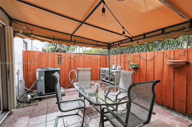 $445,000 | 18752 Northwest 84th Pl., Unit 6066, Hialeah, FL 33015